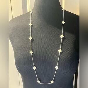 T & R silver tone and cream colored flower necklace